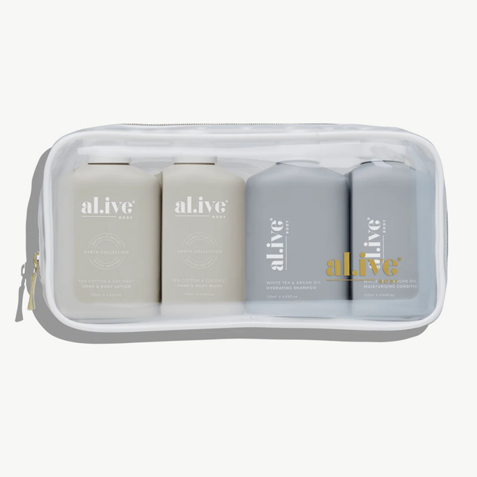 Set of 'alive' skincare products in a white travel case on a white background