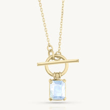 Load image into Gallery viewer, Gold necklace with a pendant featuring a moonstone on a white background