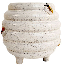 Load image into Gallery viewer, Speckled beige ceramic pot with a textured surface, resembling a beehive, on a white background.