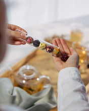 Load image into Gallery viewer, Blooming Tea Balls in Glass Tube - Better Tea Co.