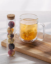 Load image into Gallery viewer, Blooming Tea Balls in Glass Tube - Better Tea Co.