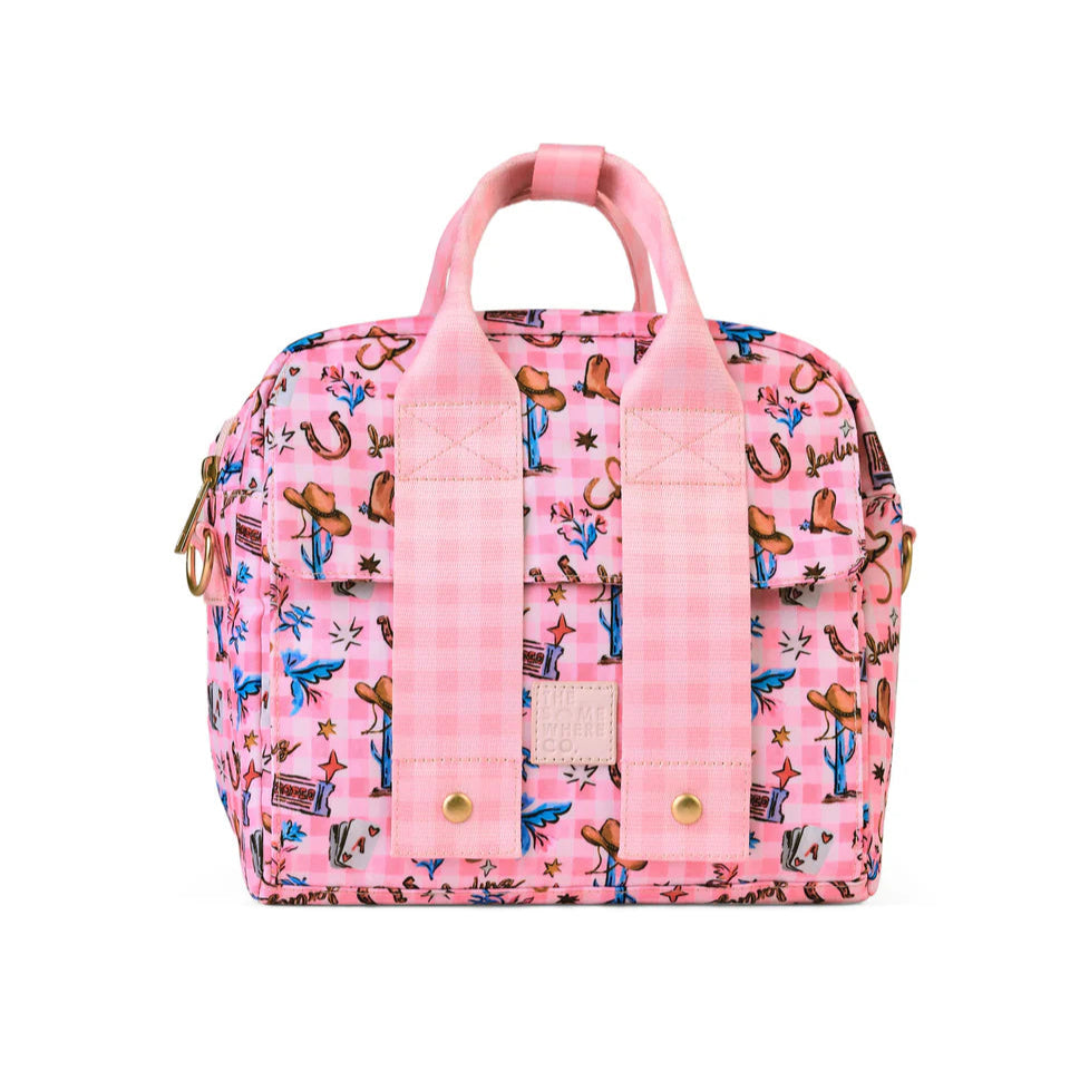 Pink lunch bag with cowboy print on a white background