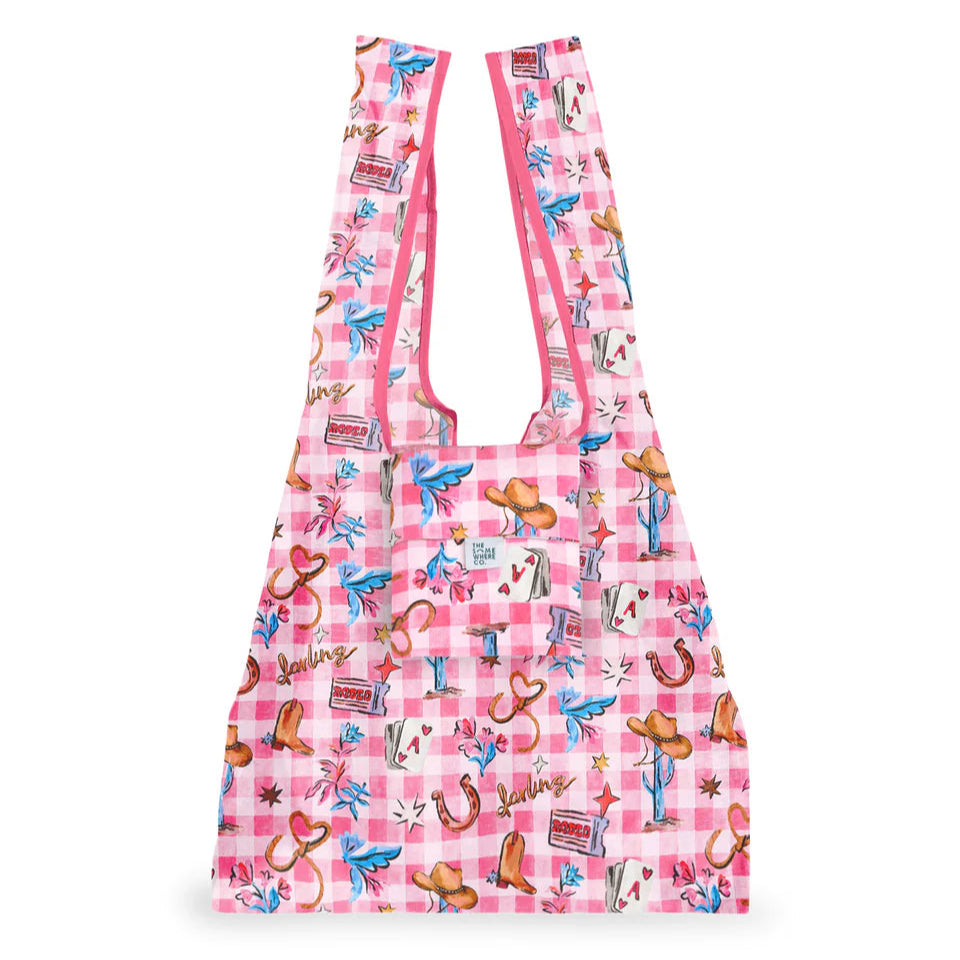Reusable bag with pink checkered pattern and cowgirl design on a white background