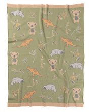 Load image into Gallery viewer, Green blanket with animal patterns on a white background