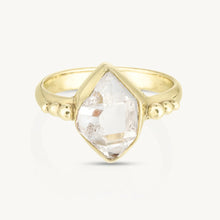Load image into Gallery viewer, Gold ring with a clear gemstone on a white background