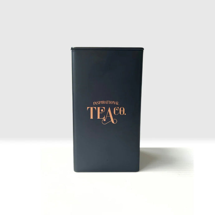 Black tea canister caddy with 'Inspirational Tea Co.' text on a white background