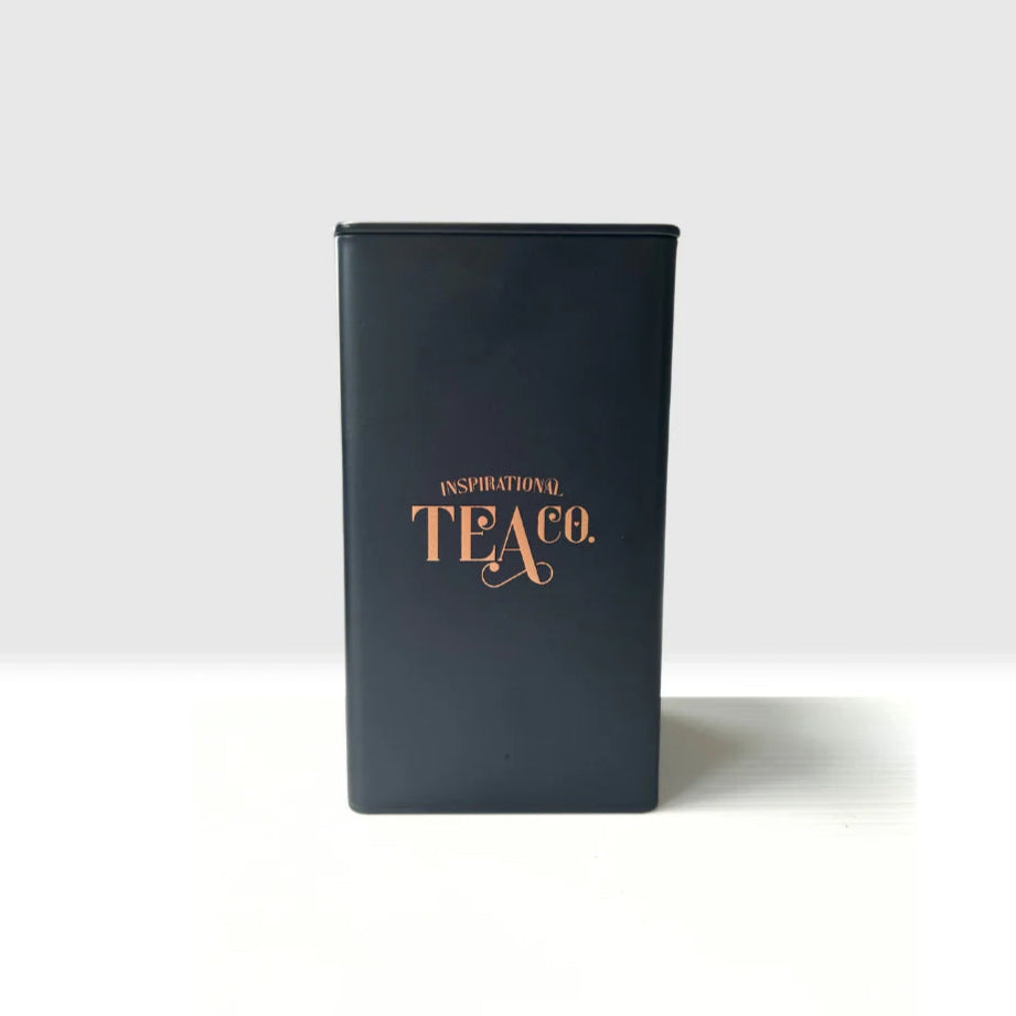 Black tea canister caddy with 'Inspirational Tea Co.' text on a white background