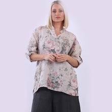 Load image into Gallery viewer, Woman wearing a floral blouse and black pants on a white background