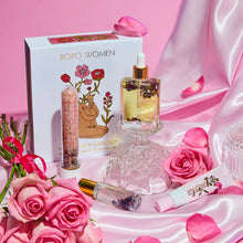 Load image into Gallery viewer, BOBO WOMEN gift set with pink roses and packaging on a pink satin background