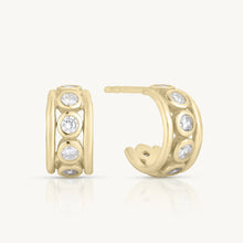 Load image into Gallery viewer, Gold hoop earrings with embedded stones on a white background