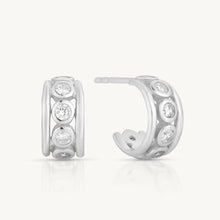 Load image into Gallery viewer, Silver hoop earrings with embedded stones on a white background