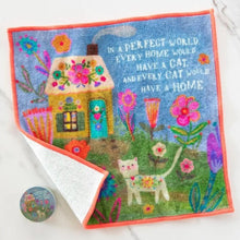 Load image into Gallery viewer, Colorful embroidered towel with a cat and house design on a white background