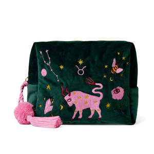 Green pouch with pink bull design and Taurus symbols on a white background