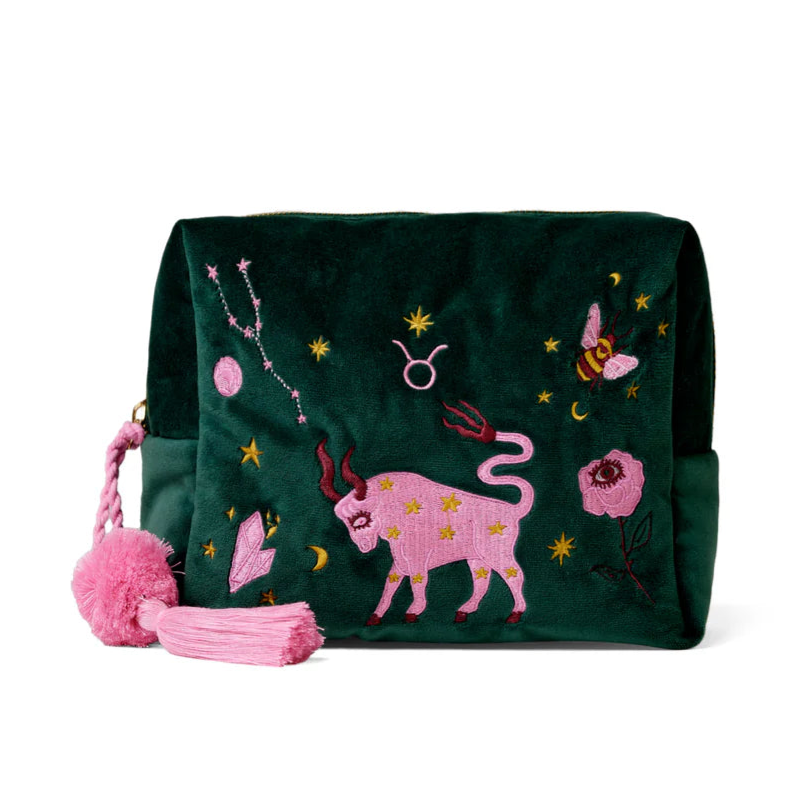Green pouch with pink bull design and Taurus symbols on a white background