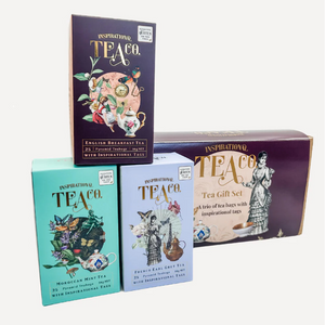 Four boxes of Inspirational Tea co teas on a white background
