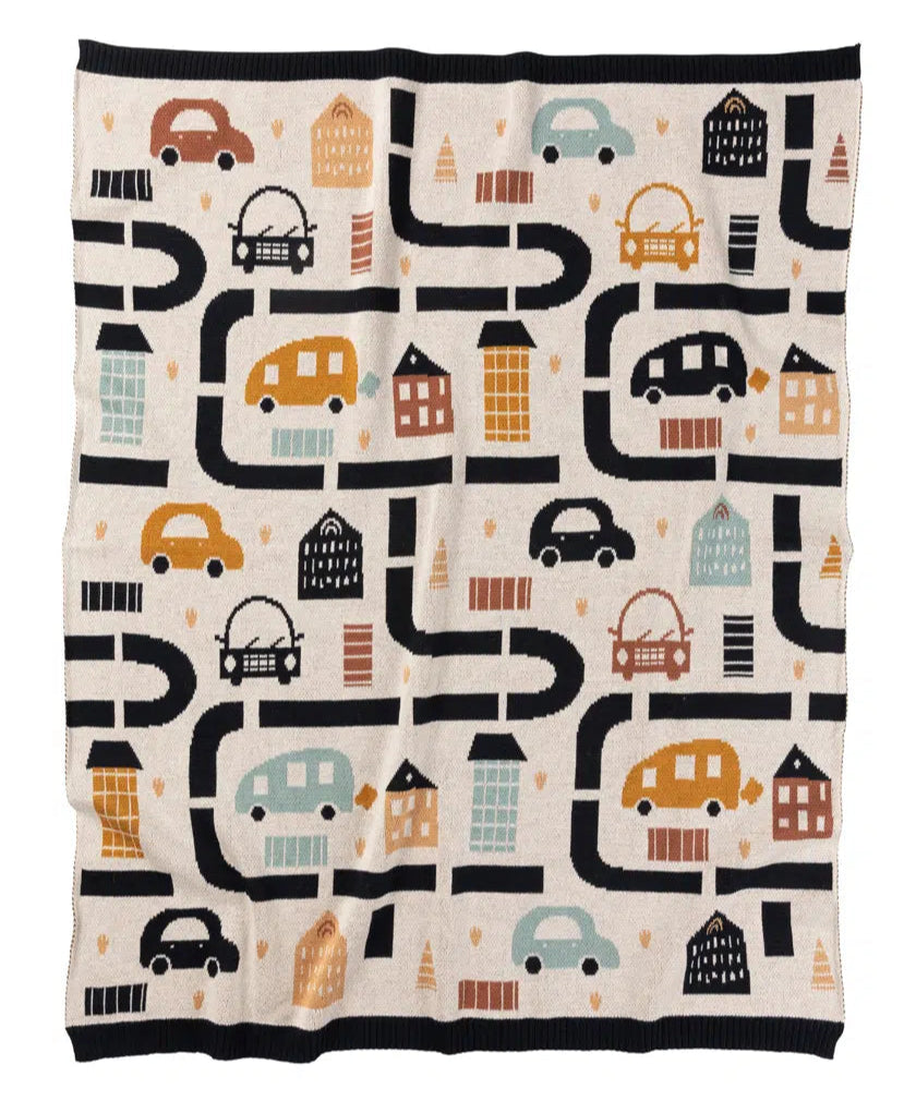 Children's blanket with road and vehicle pattern on a white background